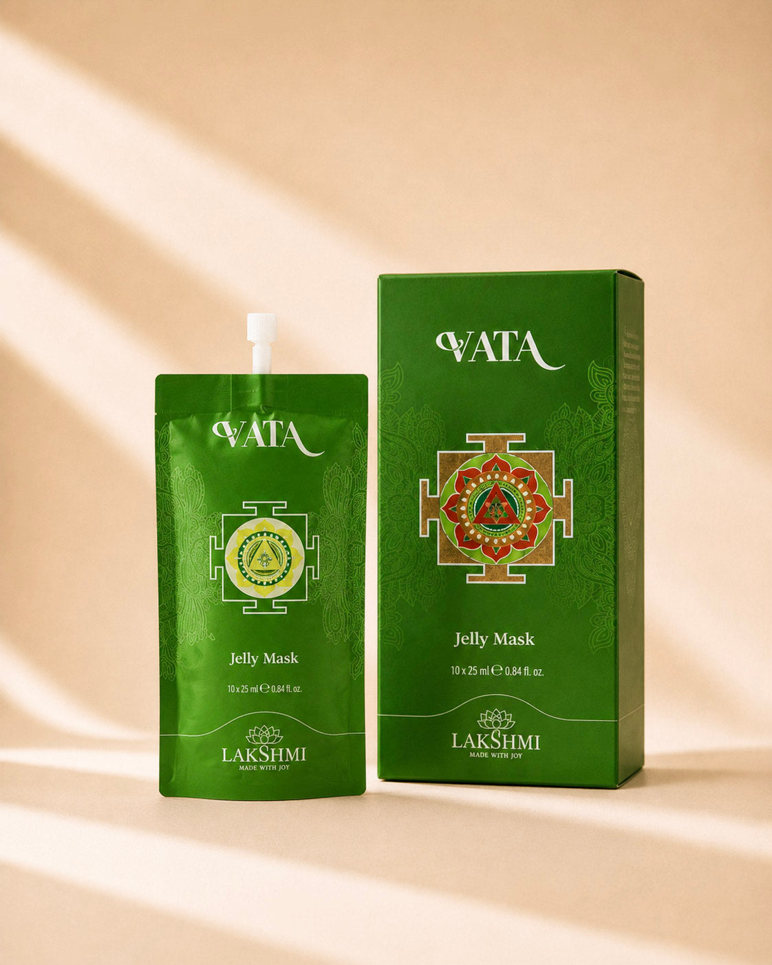 Lakshmi VATA Jelly Mask sachet and green box in soft shadow