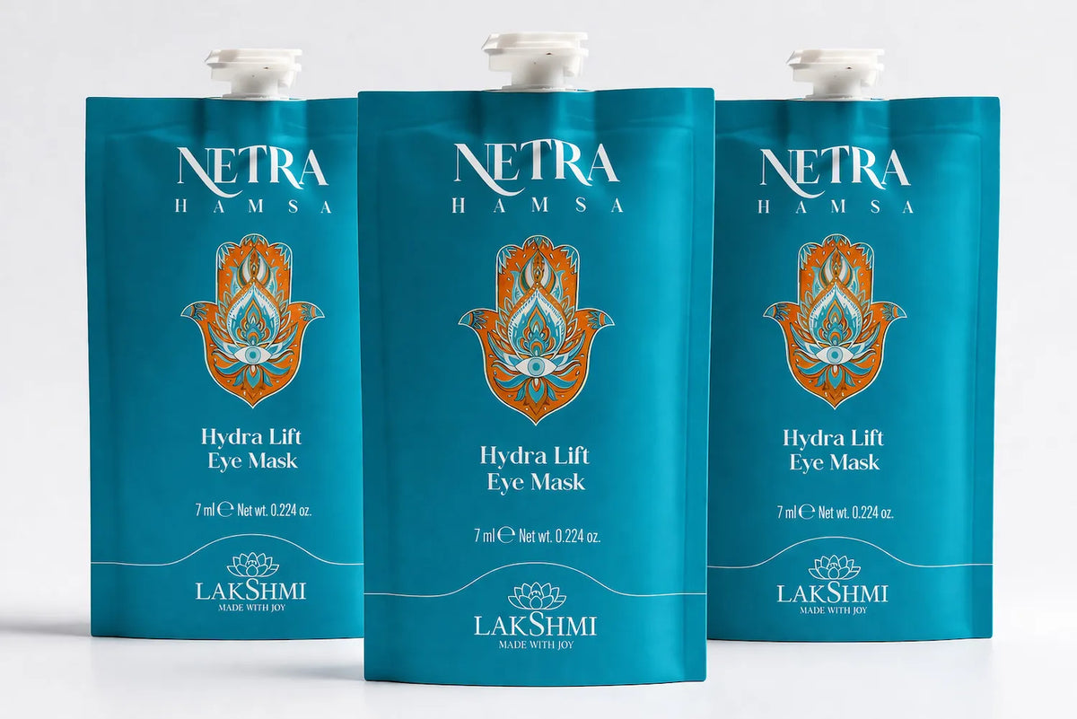 Three Lakshmi NETRA Hydra Lift Eye Mask sachets fanned out