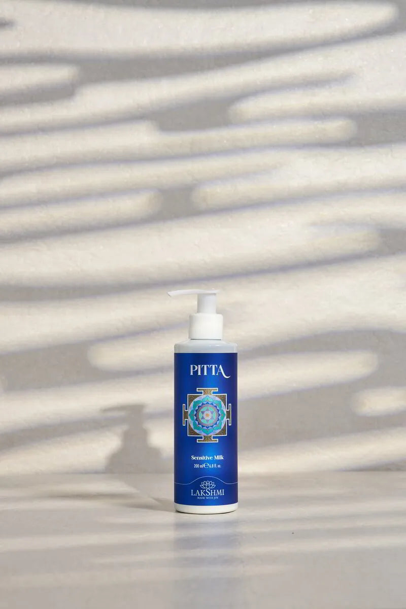 Lakshmi PITTA Sensitive Milk 200 ml pump bottle in dappled light